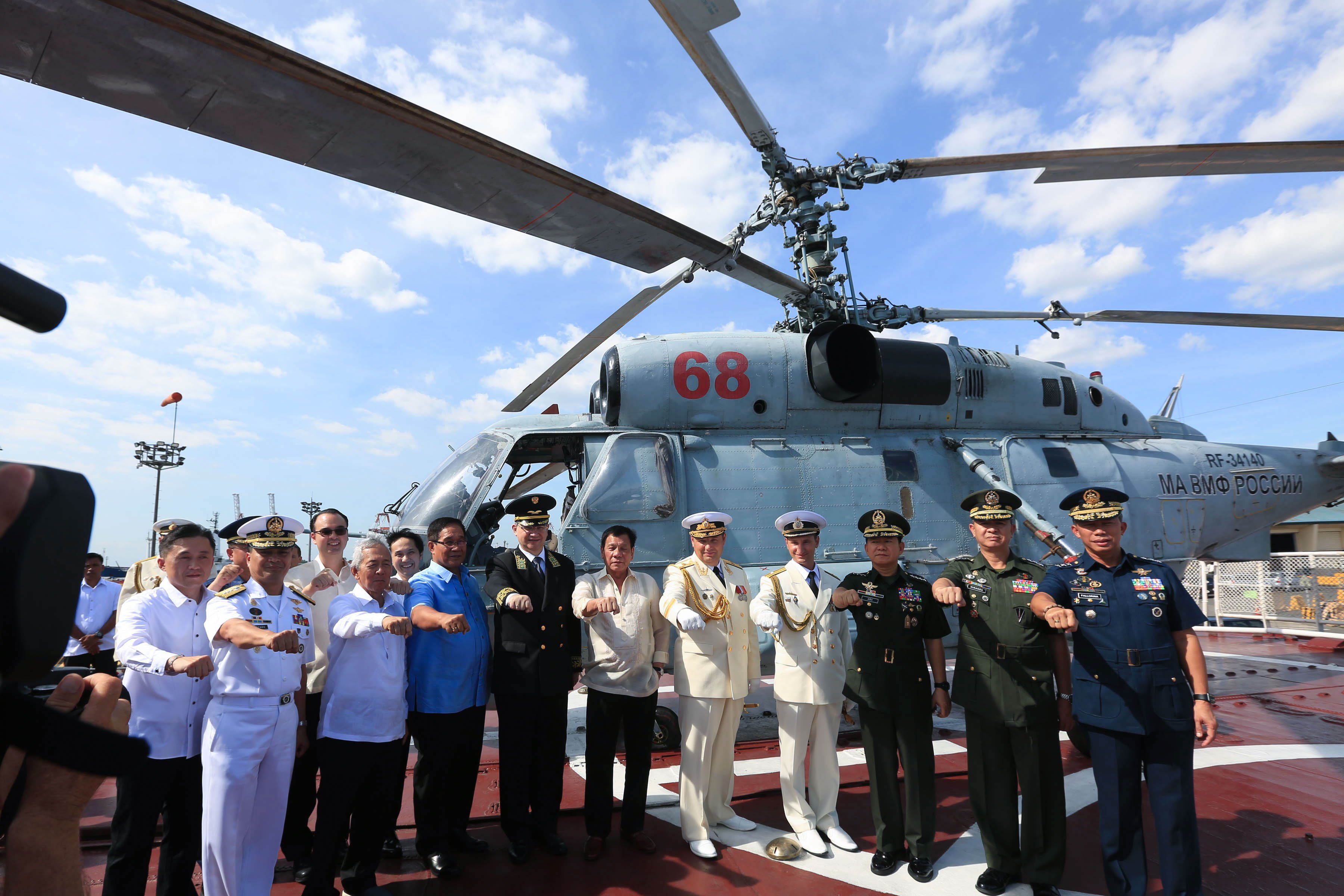 Russian Navy officials welcome Pres. Duterte, members of his cabinet aboard Admiral Tributs