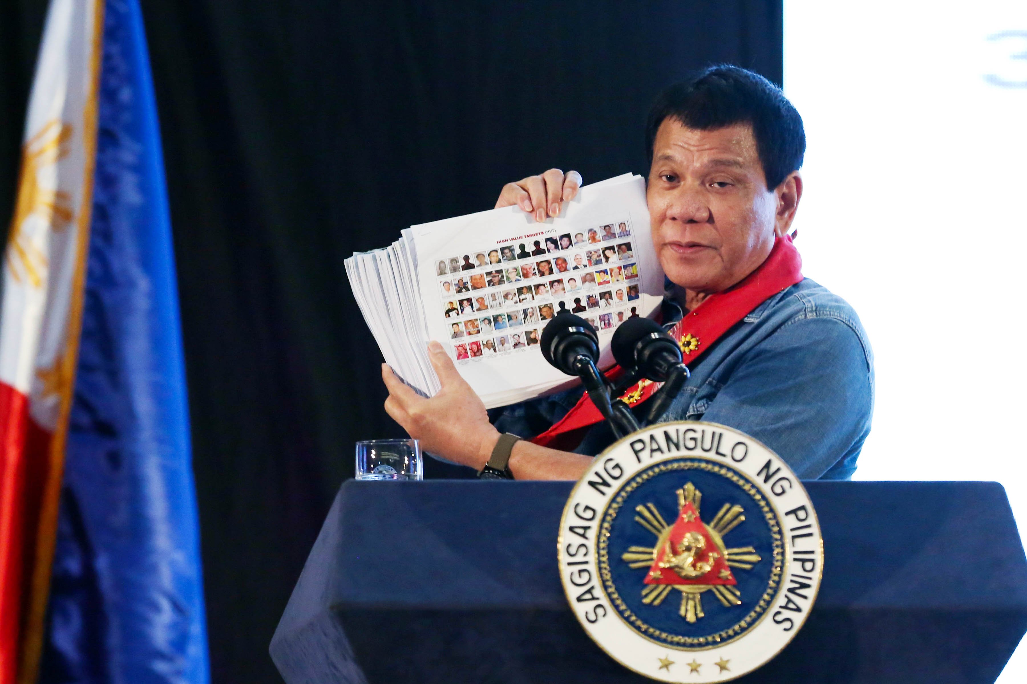 Pres. Duterte shows 'narco list' at PAWD confab