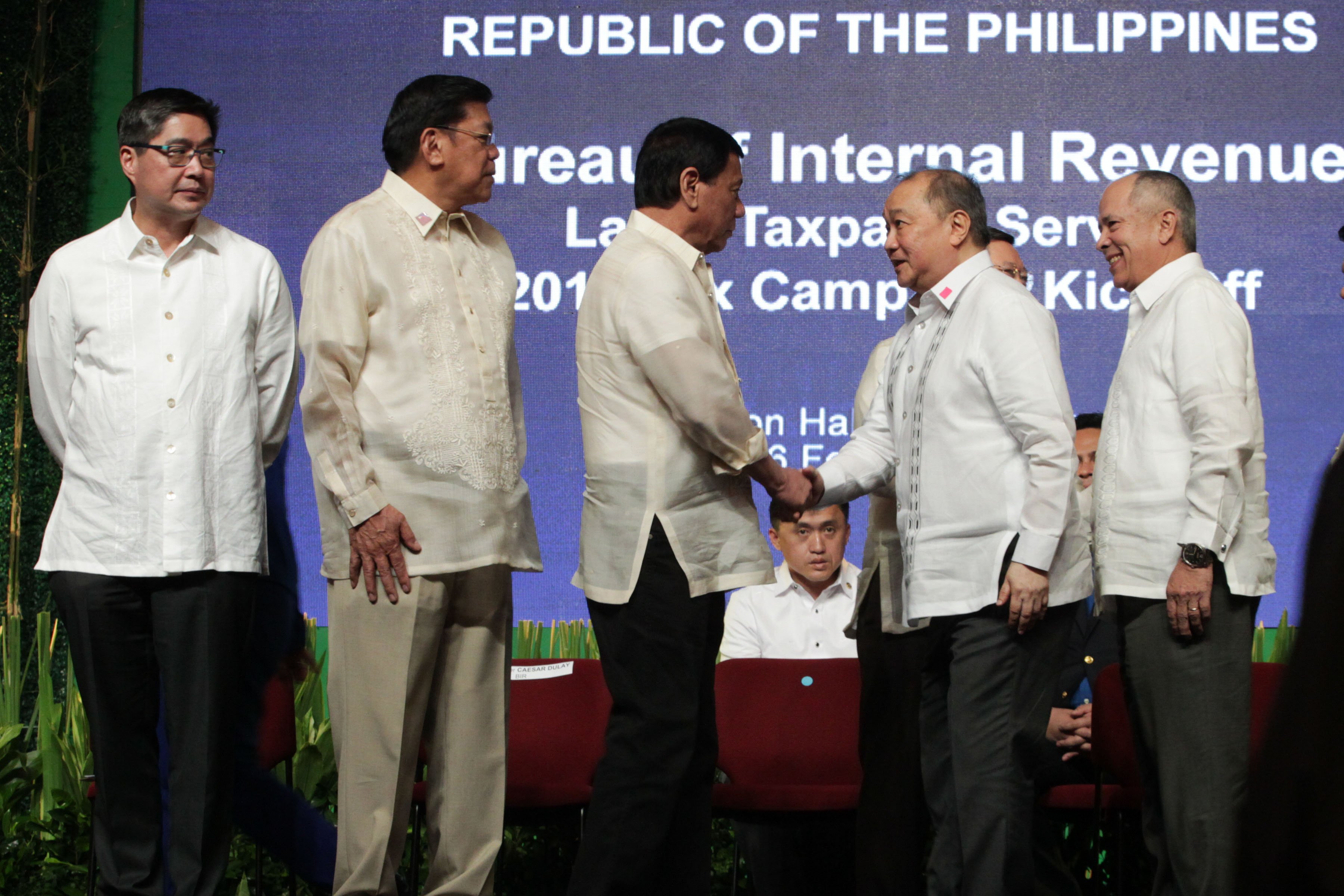 President Rodrigo Roa Duterte is welcomed by businessman Emmanuel V. Pangilinan