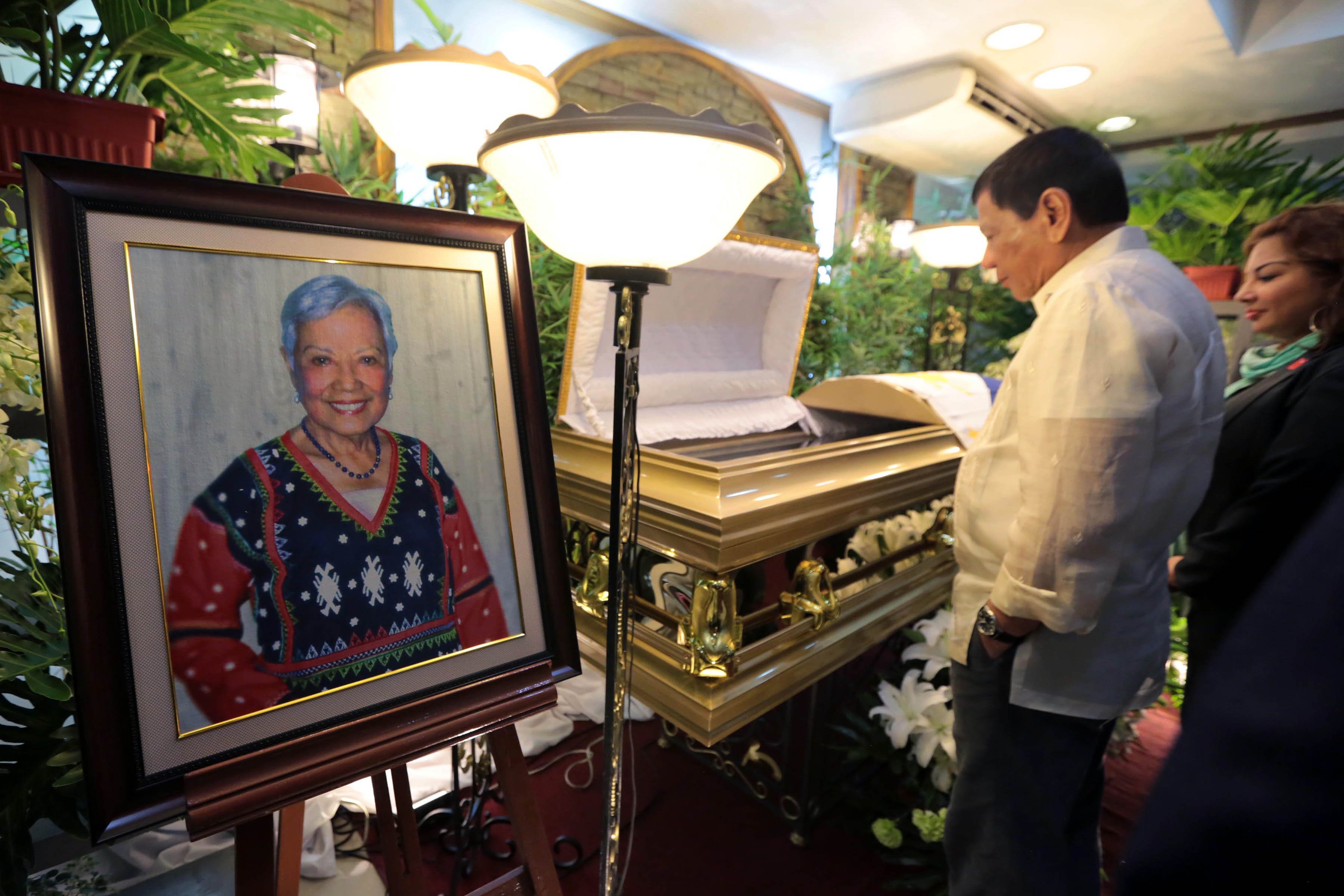 President Rodrigo Duterte looks at the remains of Former Senator Leticia Ramos-Shalani