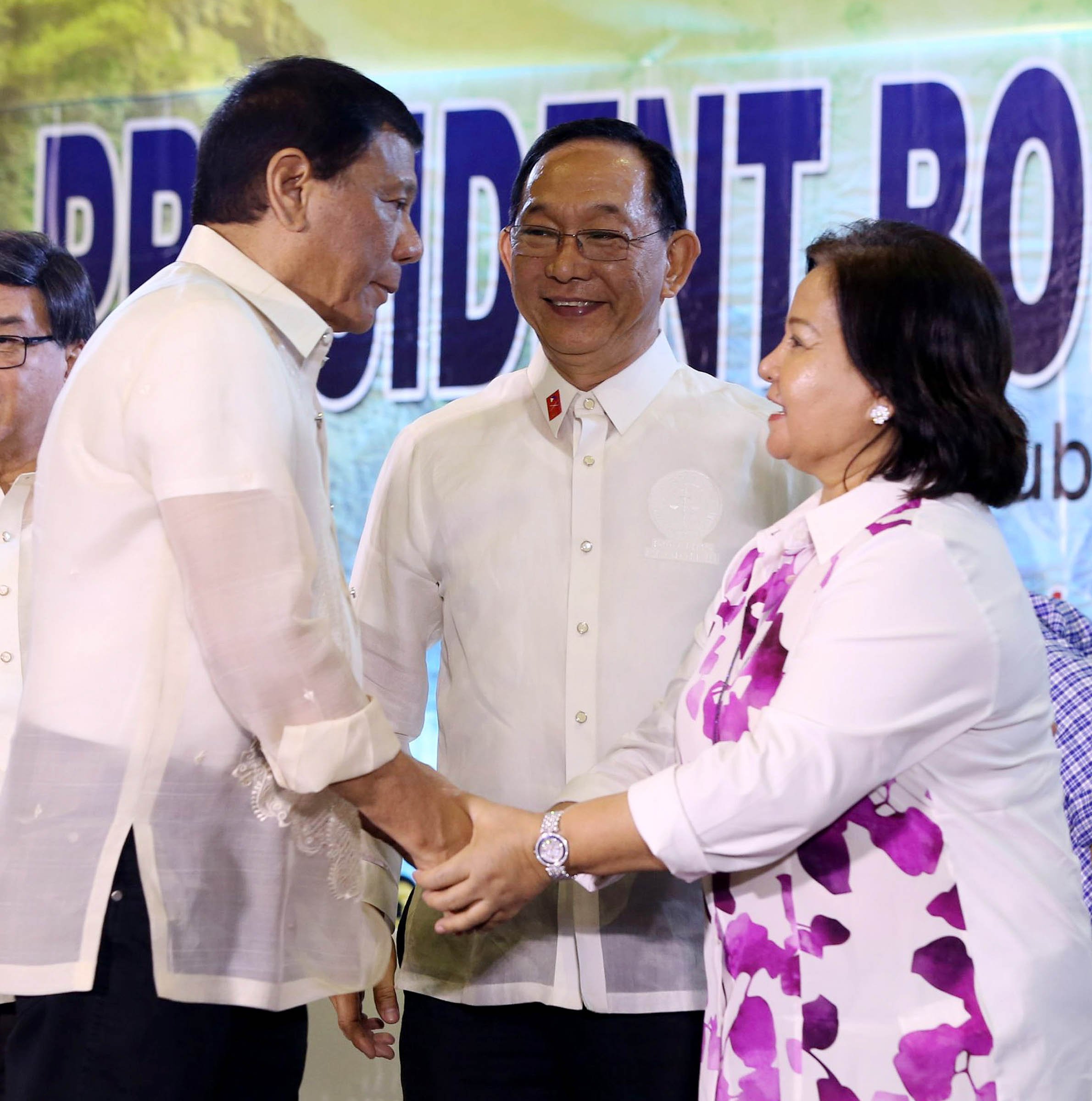 President Rodrigo Roa Duterte shakes hands with Pampanga Governor Lilia Pineda