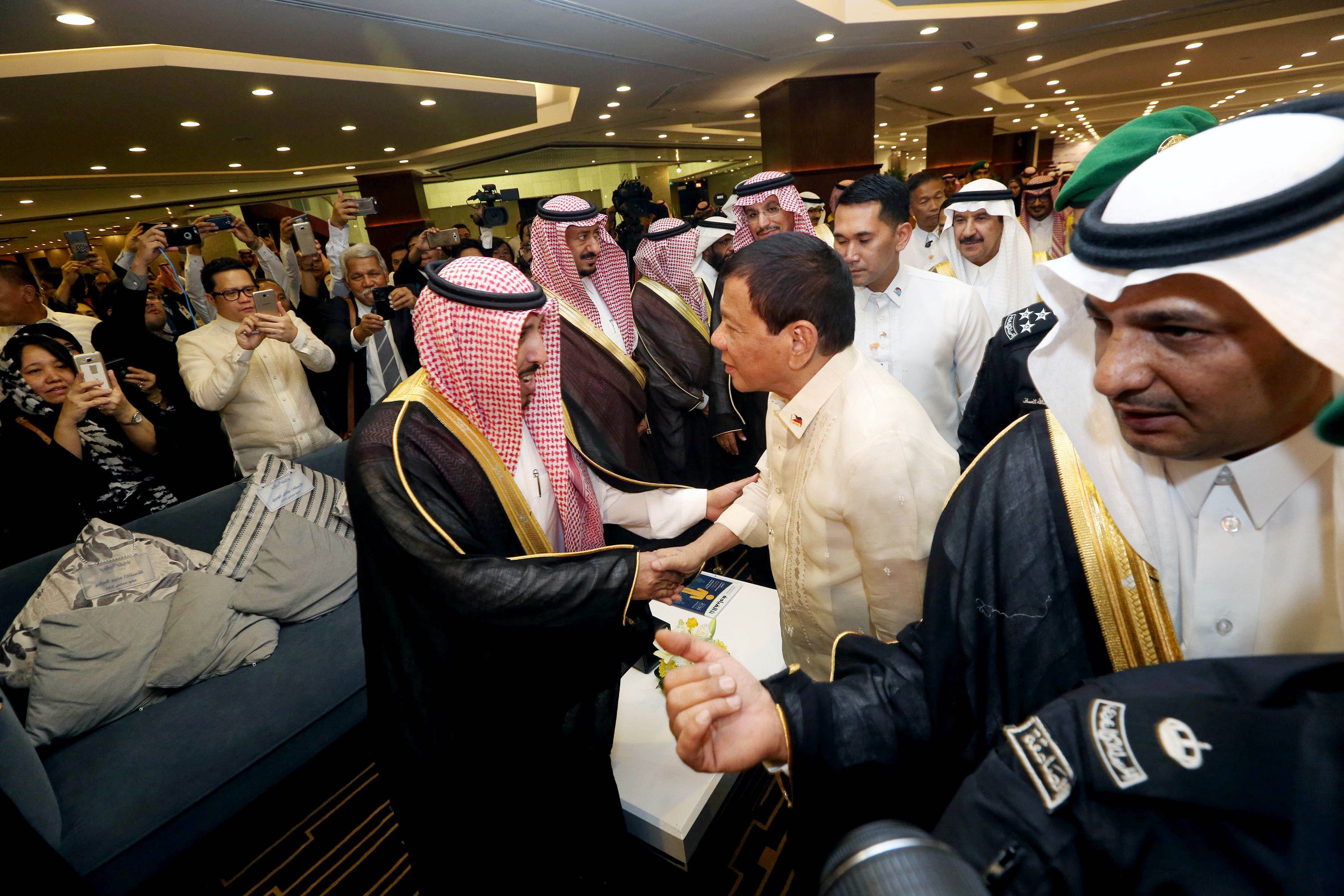 President Duterte shakes hands with an official of the Riyadh Chamber of Commerce