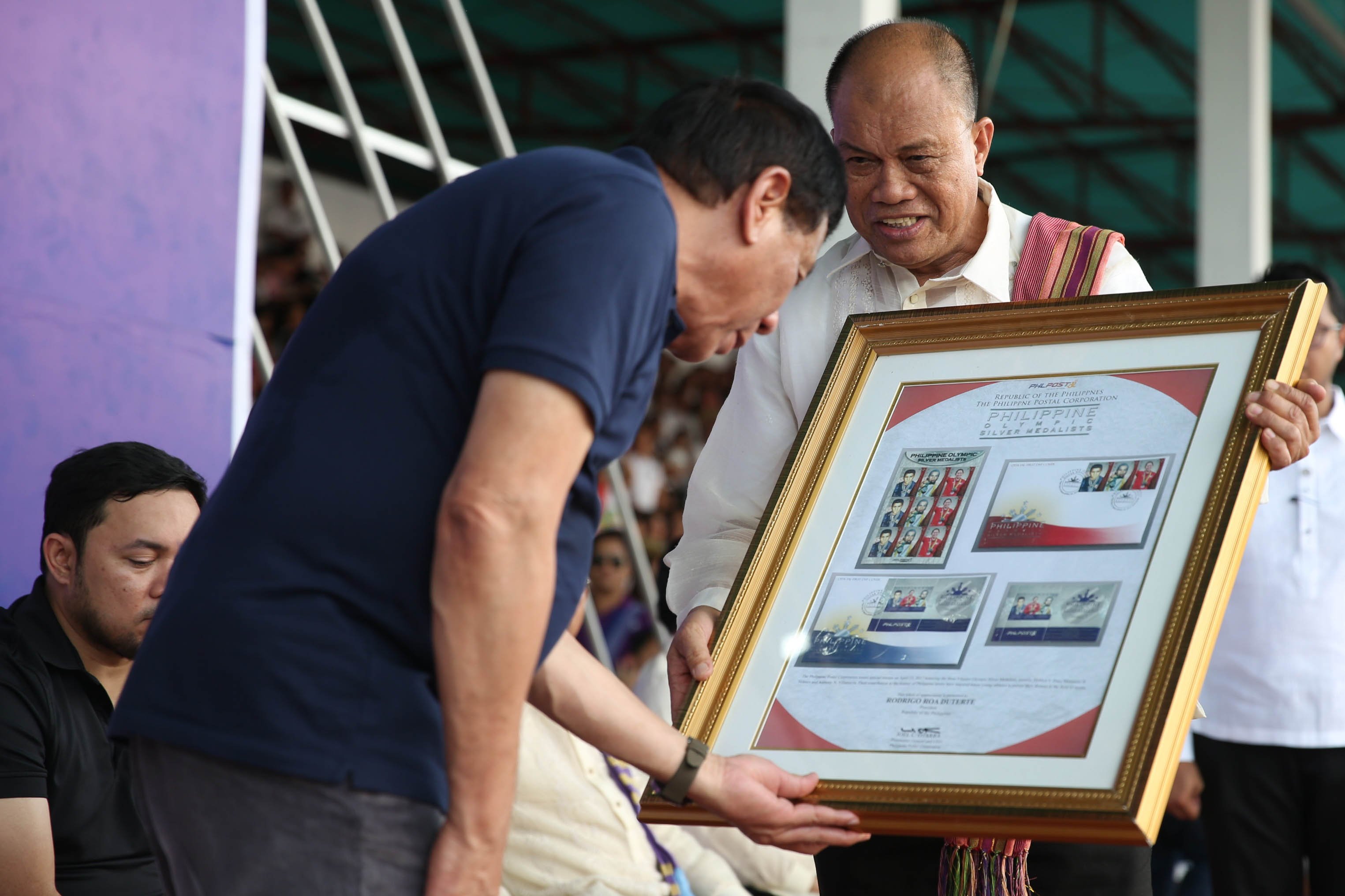 President Duterte receives Philippine Olympic Silver Medalists Stamp from Philpost chief