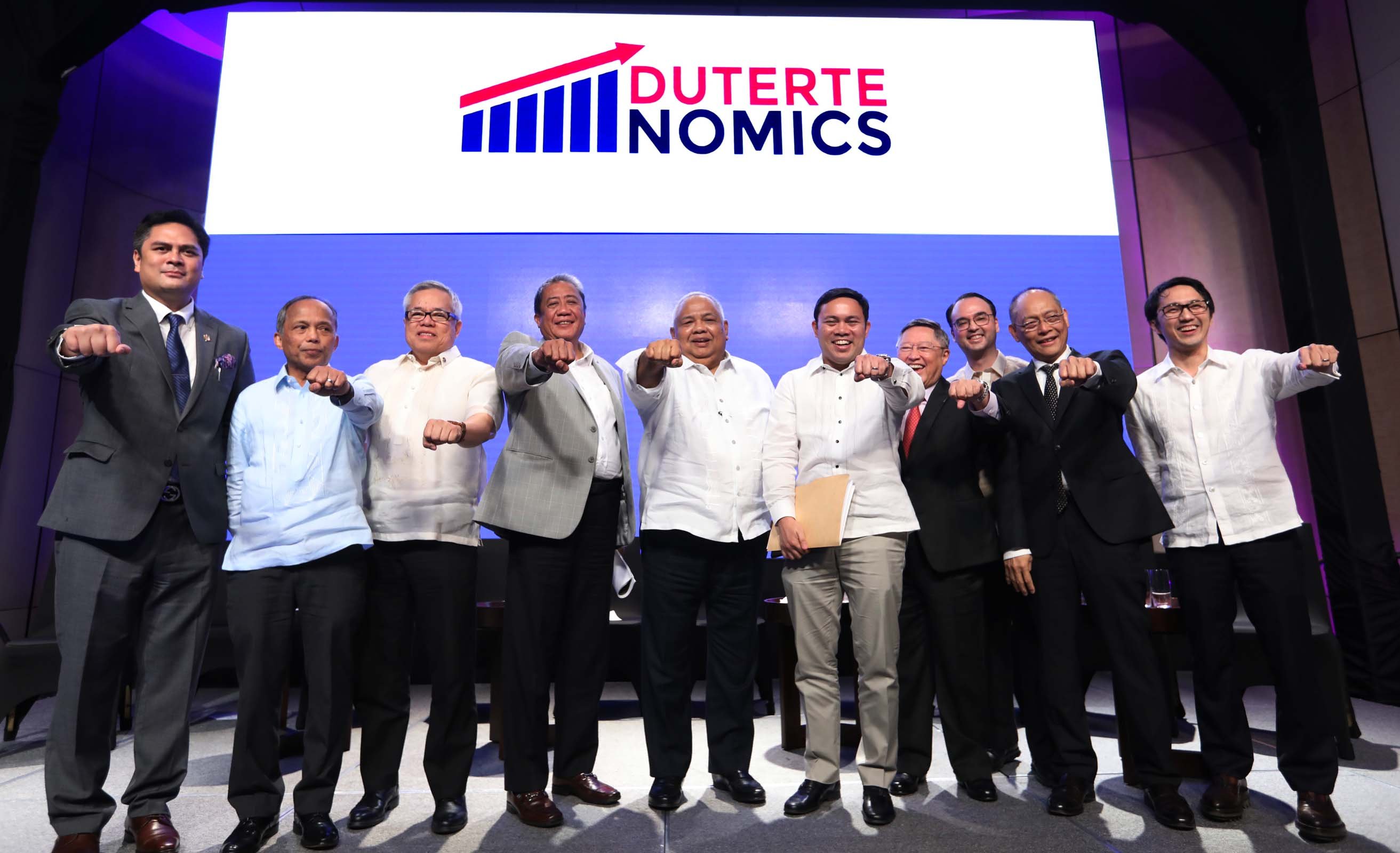 Cabinet members with familiar Duterte fist pose