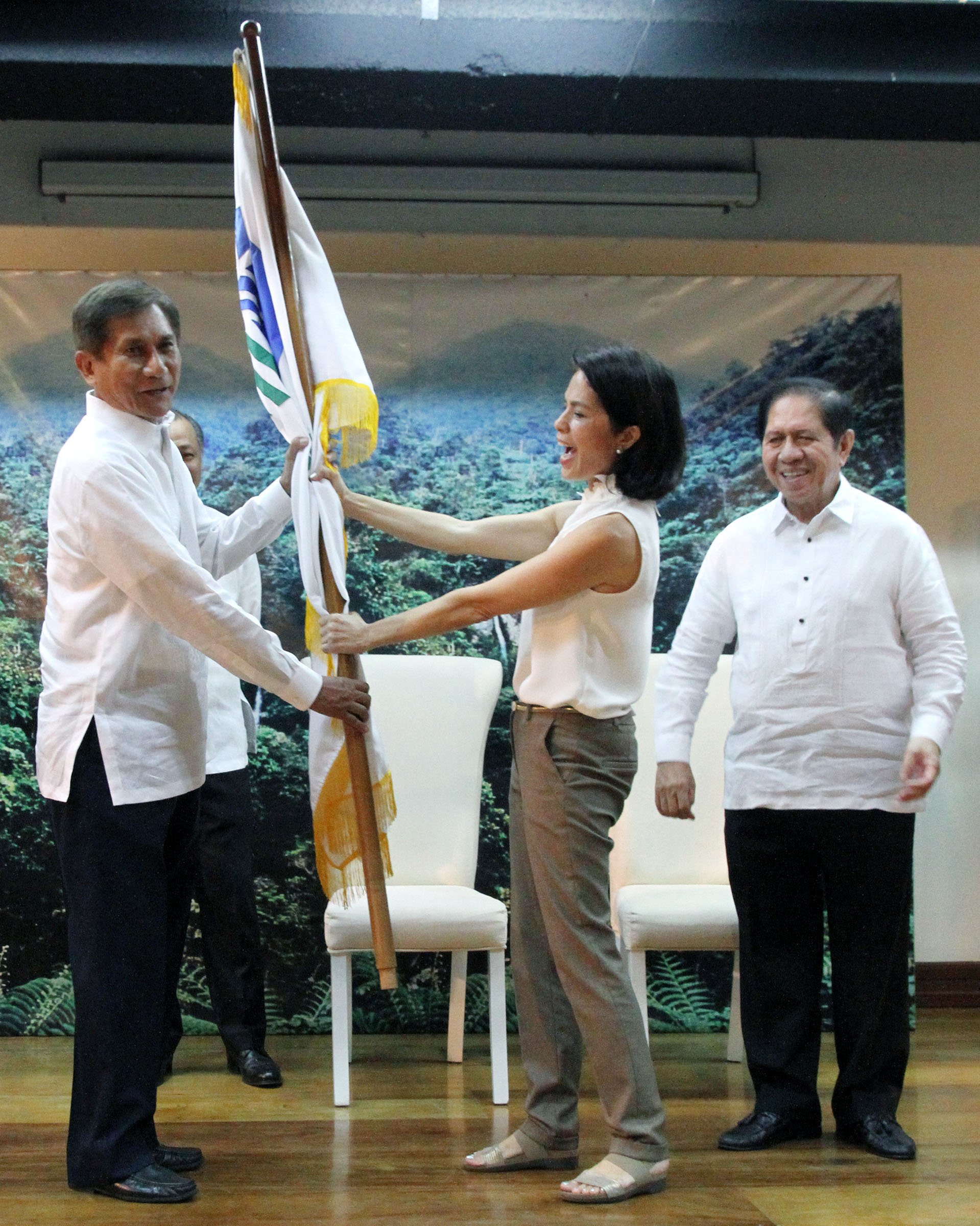 Lopez turns over DENR flag to incoming Secretary Roy Cimatu