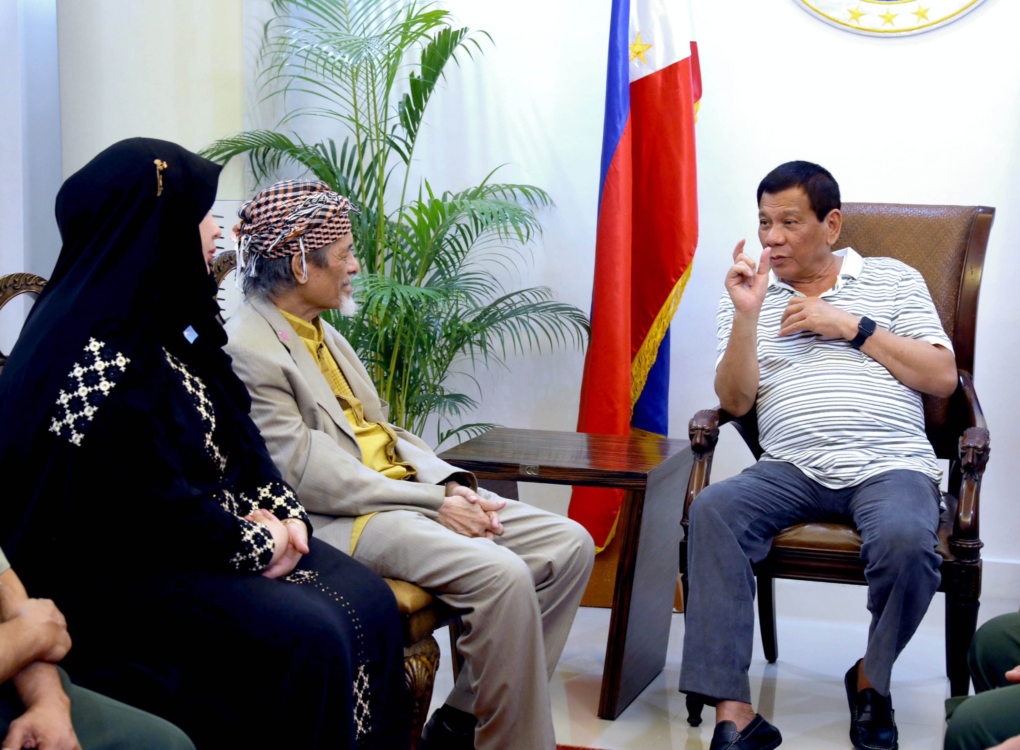 President Duterte discusses matters with Moro National Liberation Front Chairman Nur Misuari