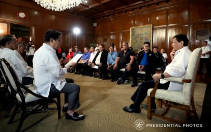 <p><strong>ENDING 'ENDO'. </strong>President Rodrigo Duterte and Labor Secretary Silvestre Bello III meet labor leaders on proposals to end contractualization in the country in Malacanang on Feb. 7, 2018. <em>(Presidential Photo)</em></p>