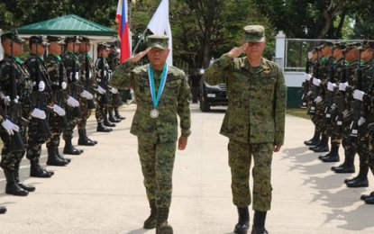 <p style="text-align: left;"><strong>MILITARY SALUTE.</strong> General Rey Leonardo Guerrero (left), the Chief of Staff of the Armed Forces of the Philippines  and  Lt. General Rozzano Briguez of Western Command (Wescom) check on the troops during the   Command's 42nd Anniversary on Thursday (March 15, 2018). <em>(Photo by Wescom Public Affairs Office)</em></p>
