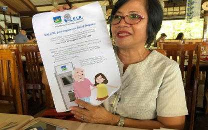 <p style="text-align: left;"><strong>APIR POSTER</strong>. The Government Service Insurance System Palawan Branch Manager Marina Ignacio displays on Thursday the APIR ( Annual Pensioners Information Revalidation) poster announcing the need to revalidate the active status of old-age and survivorship pensioners. <em>(Photo by Celeste Anna R. Formoso)</em></p>