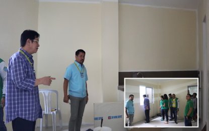 <p><strong>NEW DORM</strong>. DOH-Mimaropa Regional DIrector Eduardo C. Janairo (left) and members of an inspection team visit one of the rooms of the MAIP dormitory that is being built inside the compound of the regional health office in Project 4, Quezon City. The facility, which opens this April, will house indigent patients from Mimaropa who need to come to Manila for medical reasons. <em>(File photo by Glen S. Ramos, Community Affairs and Media Relations Officer, DOH Mimaropa)</em></p>