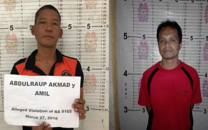<p>PDEA agents backed by policemen have arrested village councilor Abdulraup Akmad (left) of Barangay Poblacion, Malangas, Zamboanga Sibugay and Junifer Villaver (right), a member of a drug syndicate, in Dipolog City, Zamboanga del Norte in separate anti-drug operations. <em><strong>(Photo courtesy: PDEA-9)</strong></em></p>