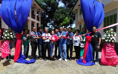 <p>Zamboanga Rep. Celso Lobregat (in dark glasses) cuts the ribbon in a recent inauguration of a school building in Zamboanga City. <em><strong>(File photo by: Teofilo P. Garcia Jr.)</strong></em></p>