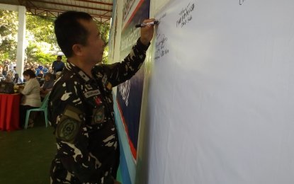 <p>Brig. Gen. Cirilito Sobejana, Joint Task Force Sulu commander, joins the signing of commitment to good governance in a recent assembly of local government officials in Camp Bautista, Jolo, Sulu. <em><strong>(File photo: Teofilo P. Garcia Jr.)</strong></em></p>